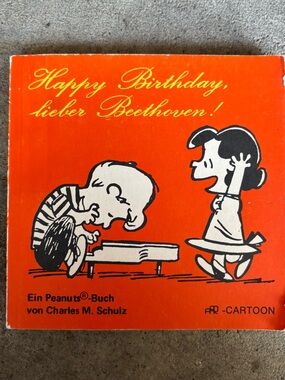 Peanuts Orange and Black Happy Birthday Lieber Beethoven Cover Art